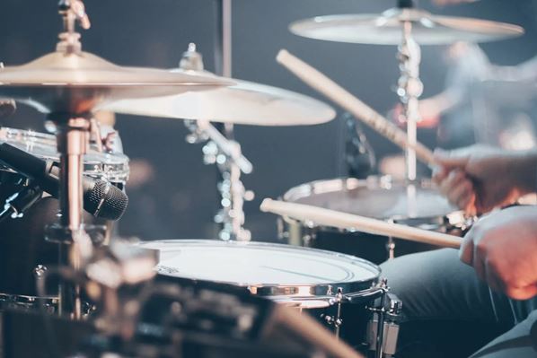 Musician playing the drums